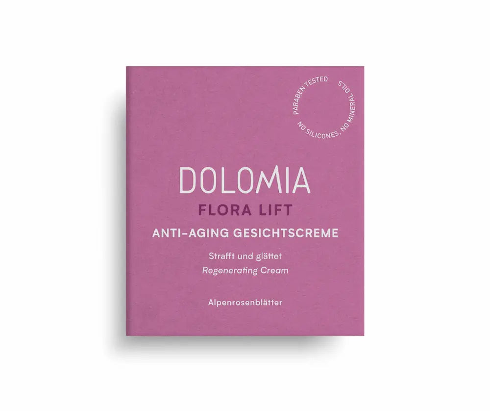 Dolomia Flora Lift Anti-Aging Gesichtscreme in beerefarbener Faltschachtel, Vorderansicht mit Hinweis „Strafft und glättet" und Alpenrosenblätter