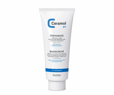 Ceramol 311 Cremabase Basiscreme in weißer Tube mit blauem Logo, stehend auf der Verschlusskappe, für hyperreaktive und allergische Haut