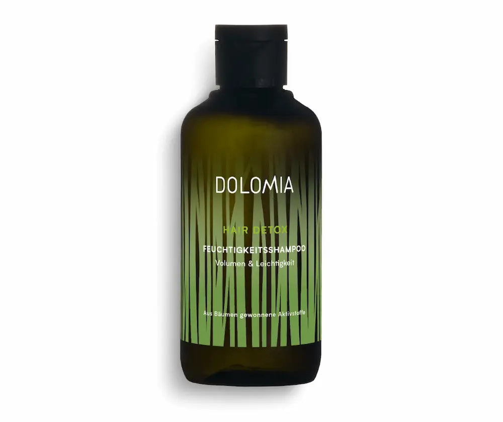 Dolomia Hair Detox Feuchtigkeitsshampoo für Volumen und Leichtigkeit in grüner Flasche mit Grasmotiv, Vorderansicht