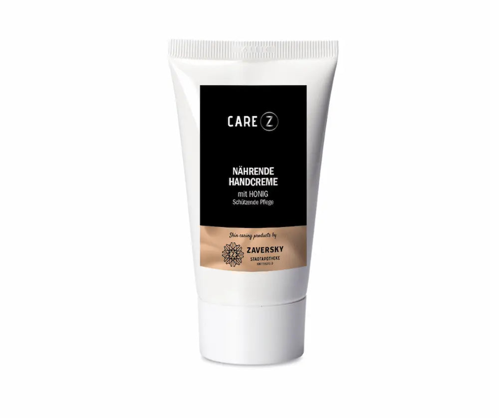 CARE Z Nährende Handcreme mit Honig in weißer Tube, schwarzes Etikett mit Zaversky-Logo, schützende Pflege.