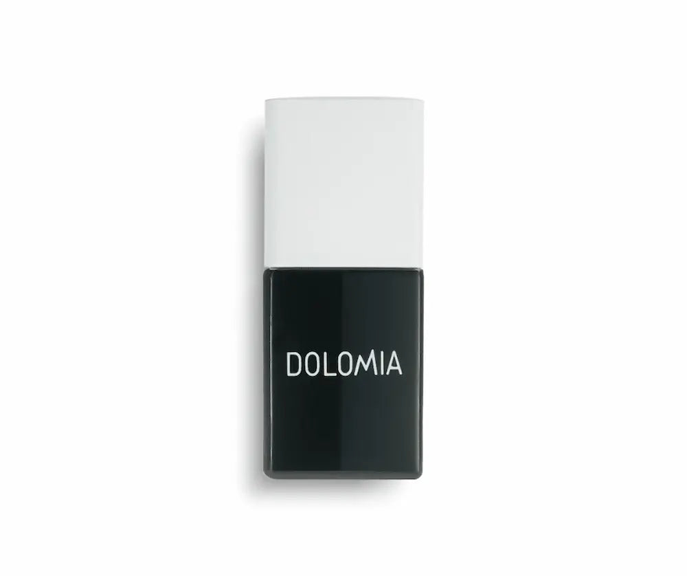 Rechteckige schwarze Nagellackflasche von Dolomia mit weißem Deckel und hellem Markenschriftzug, Vorderansicht vor weißem Hintergrund.